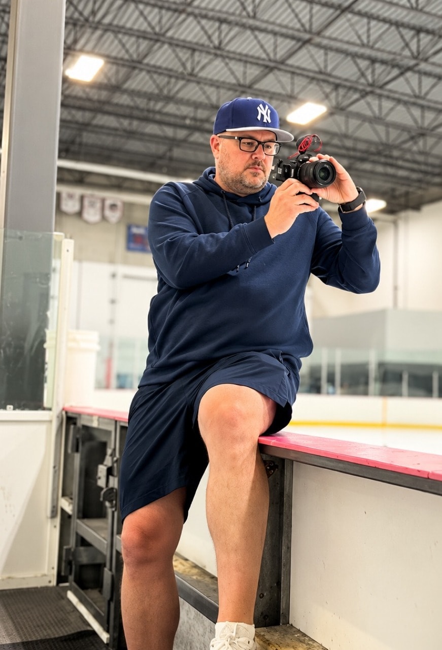 Bryan Reynolds shooting content at the ice rink for HDC Calgary